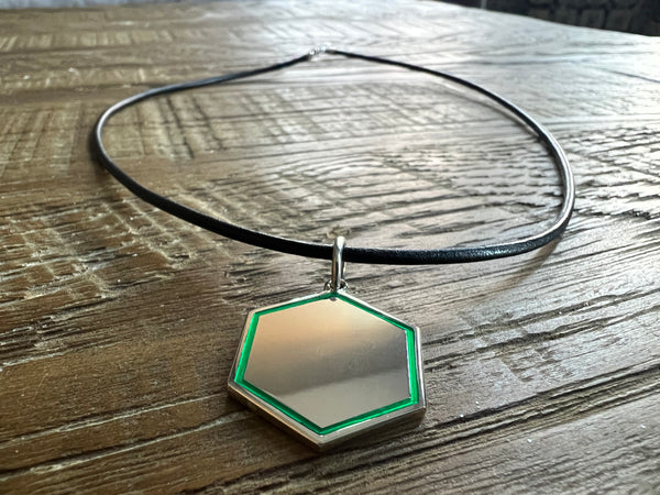 Sterling Silver Hex on You Pendant with Transparent Green Resin